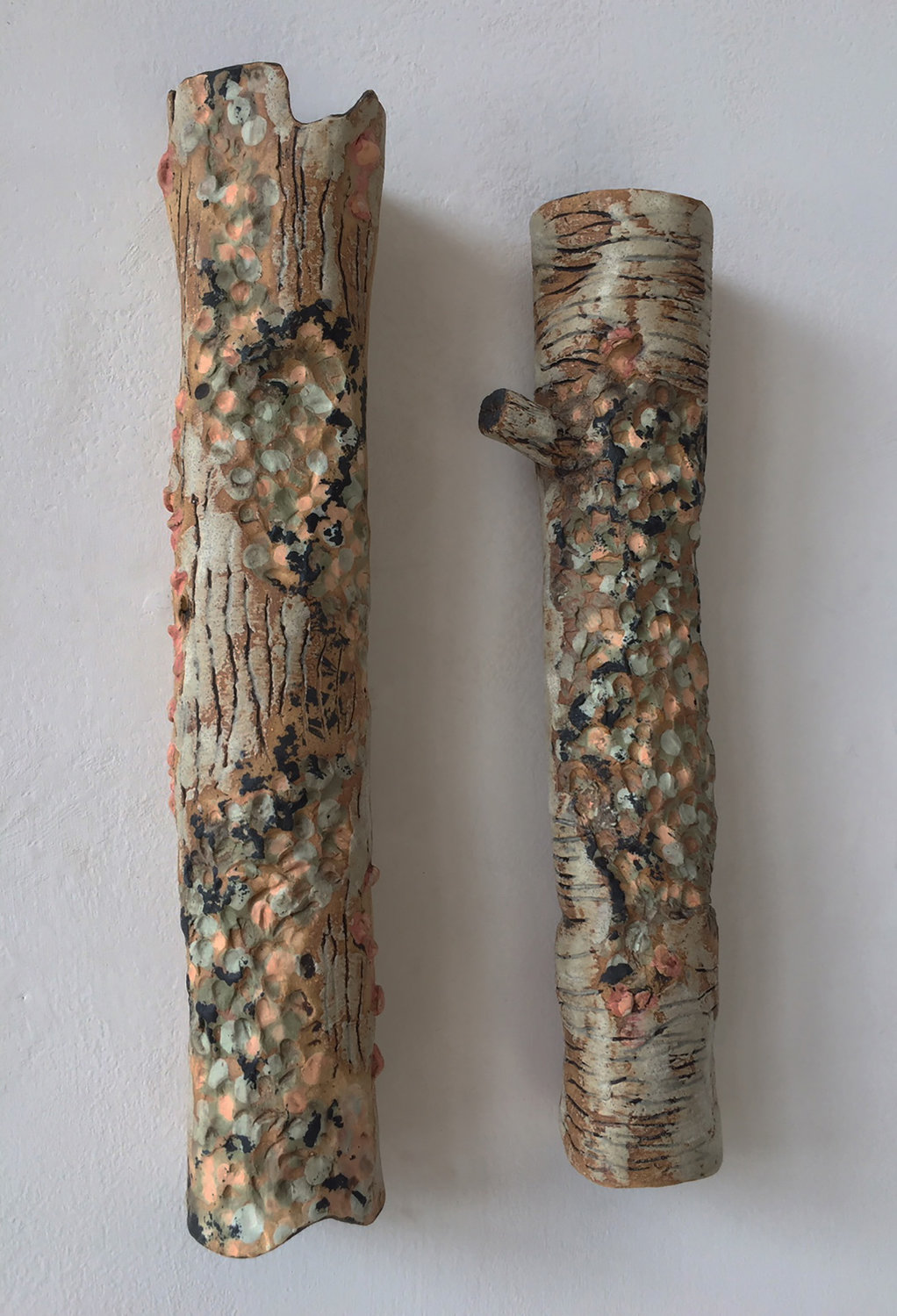"Bark Poles," 2021. Glazed stoneware and acrylic.